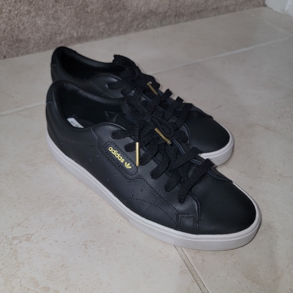 Sleek Adidas Sneakers - Picture 1 of 6